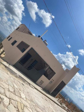 Casa vista da montanha